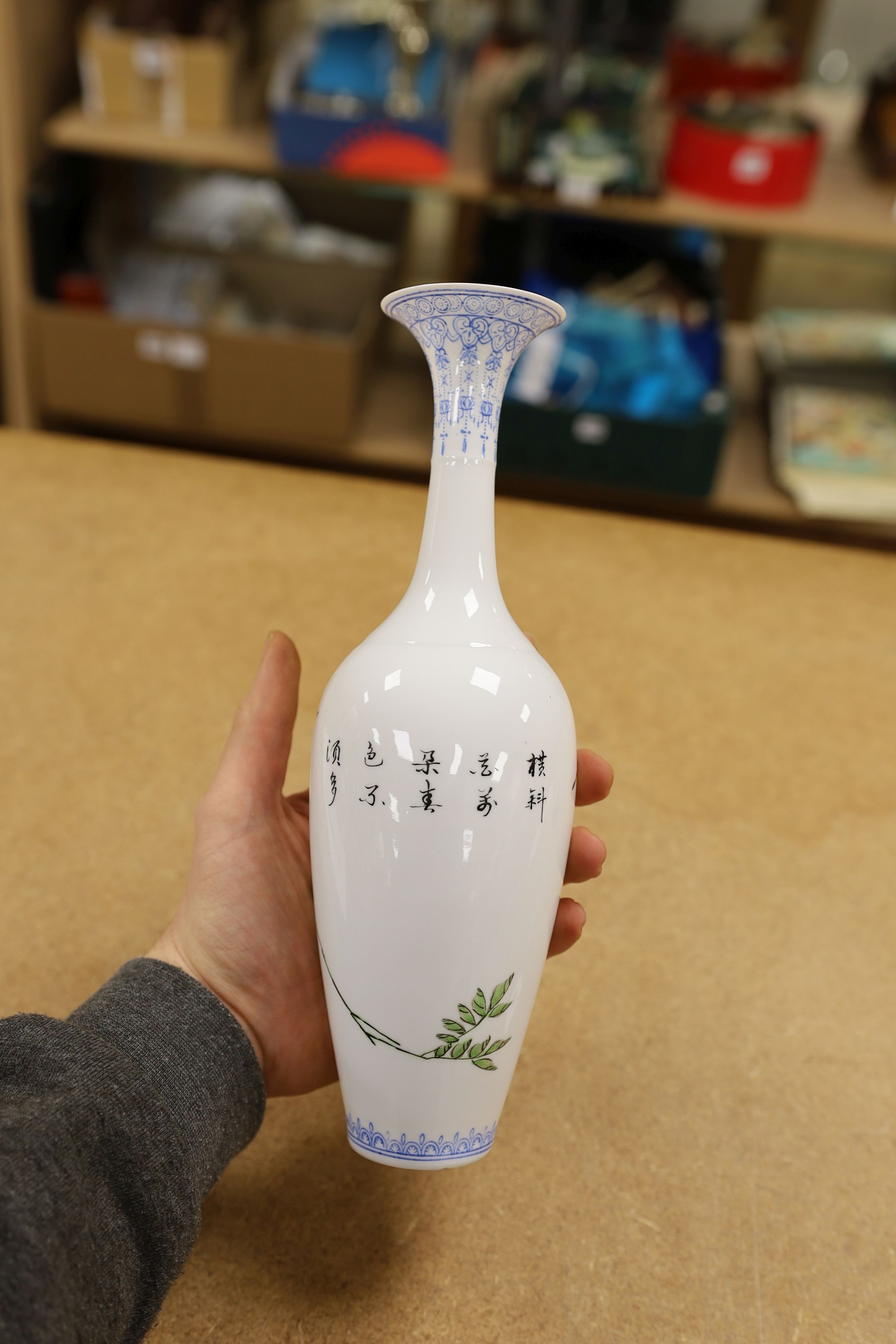 Three Chinese porcelain vases, tallest 26cm